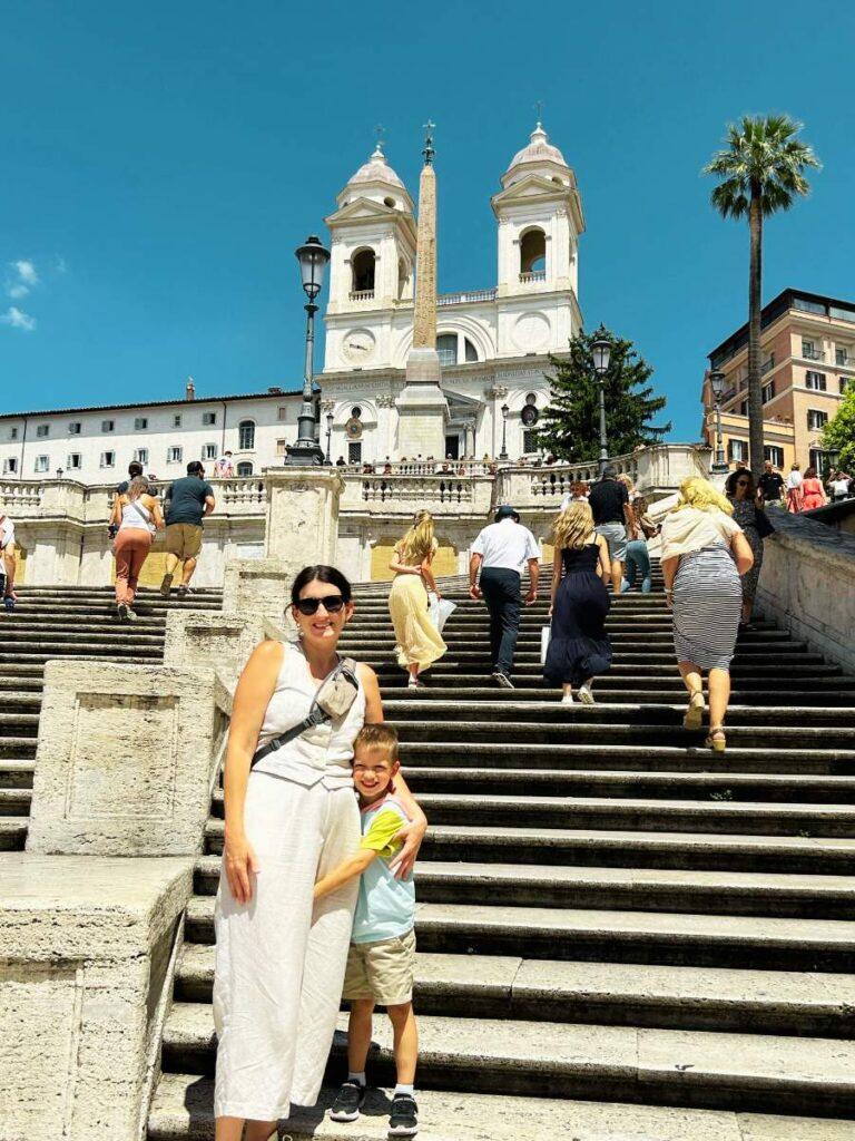 Mom and child on spanish steps in rome