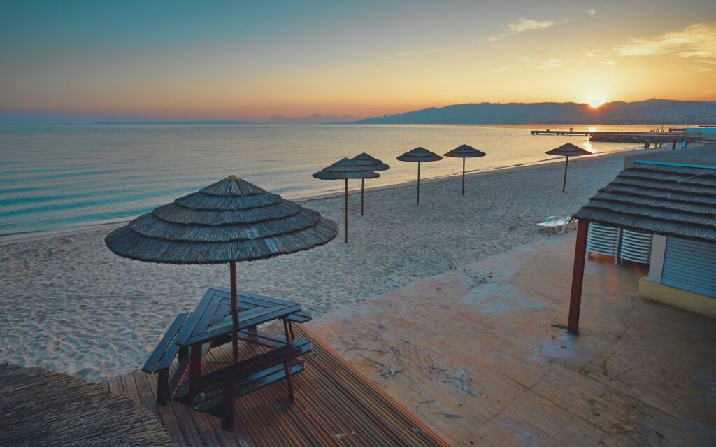 Beach Chair and Umbrella at Sunset. Beach Clubs Antibes
