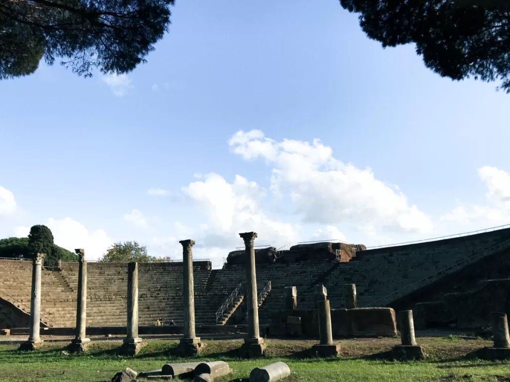 Ostia Antica Day Trips from Rome in Winter.  Ancient Columns in a green field 