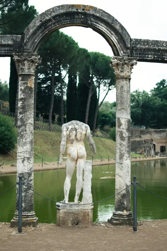 Ancient statue of a man in a garden.  Day trips from Rome in Winter