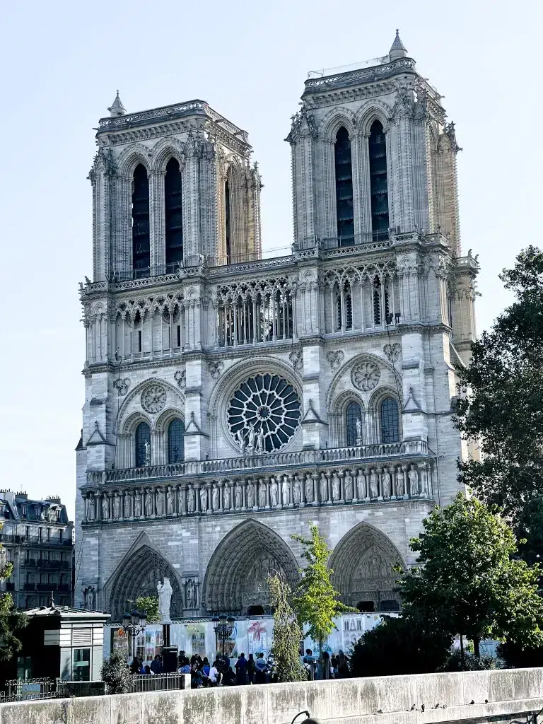 Notre Dame cathedral with large bell towers and intricate architecture