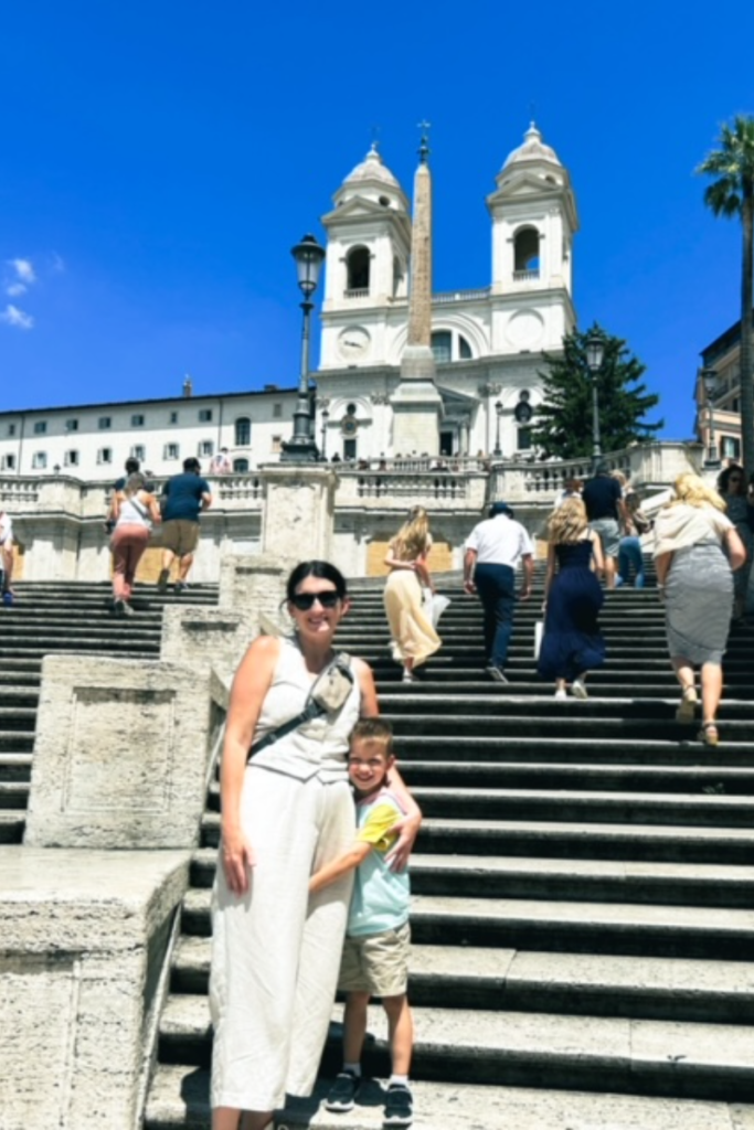 Mom and son standing on steps (Spanish Steps) in Rome. Rome Itinerary for kids