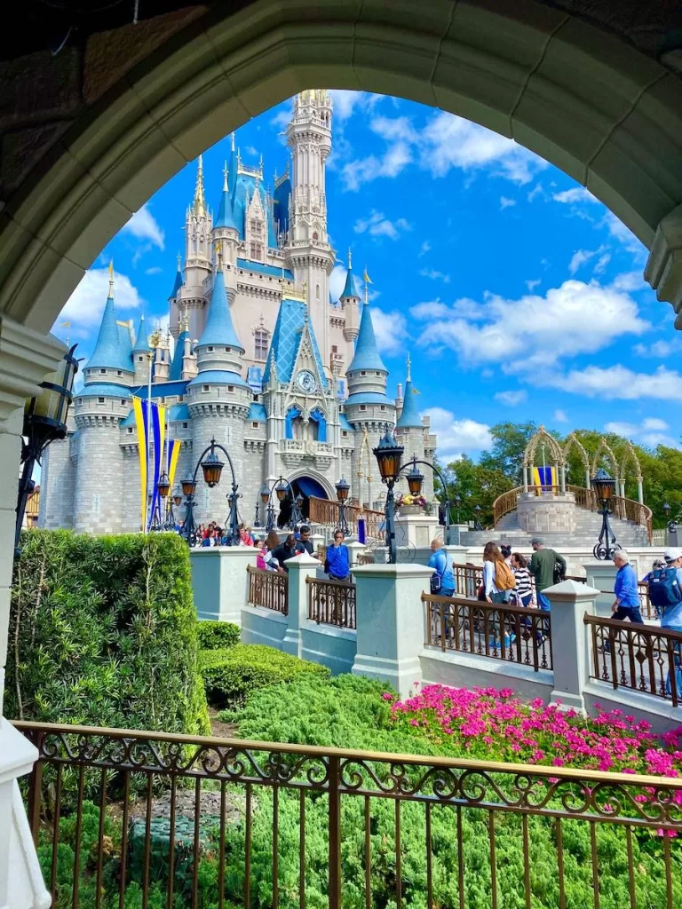 white and blue castle at Magic Kingdom Disney World