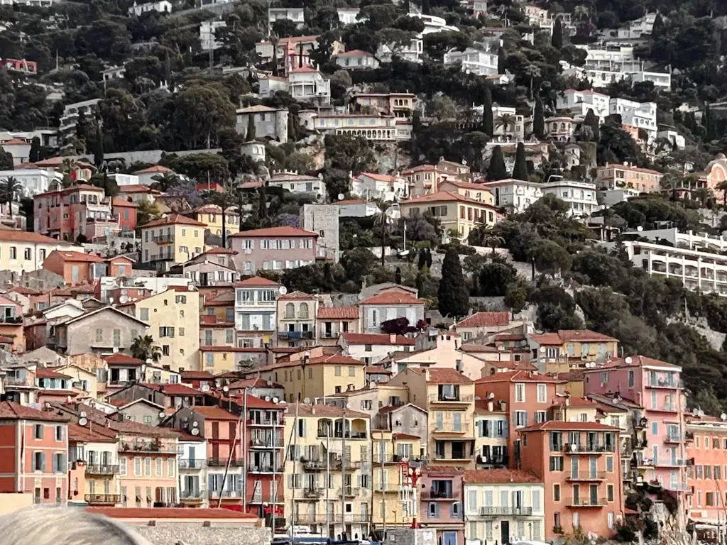Colorful houses on a hill in the french riviera.  Parking Villefranche Sur Mer