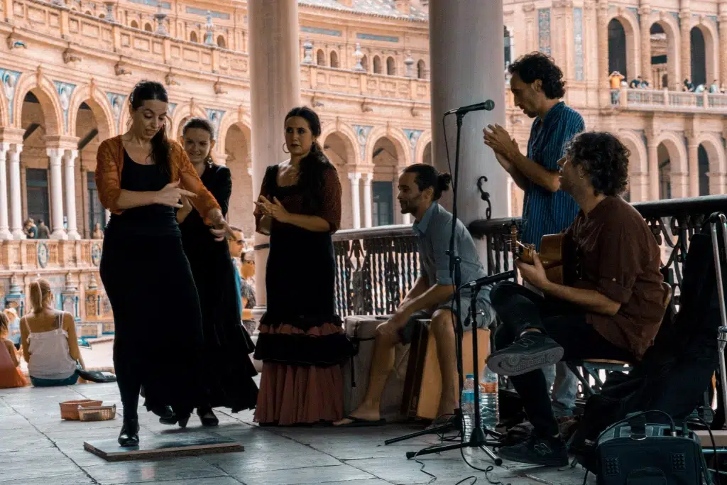 People gathered around singing and dancing in Madrid Spain