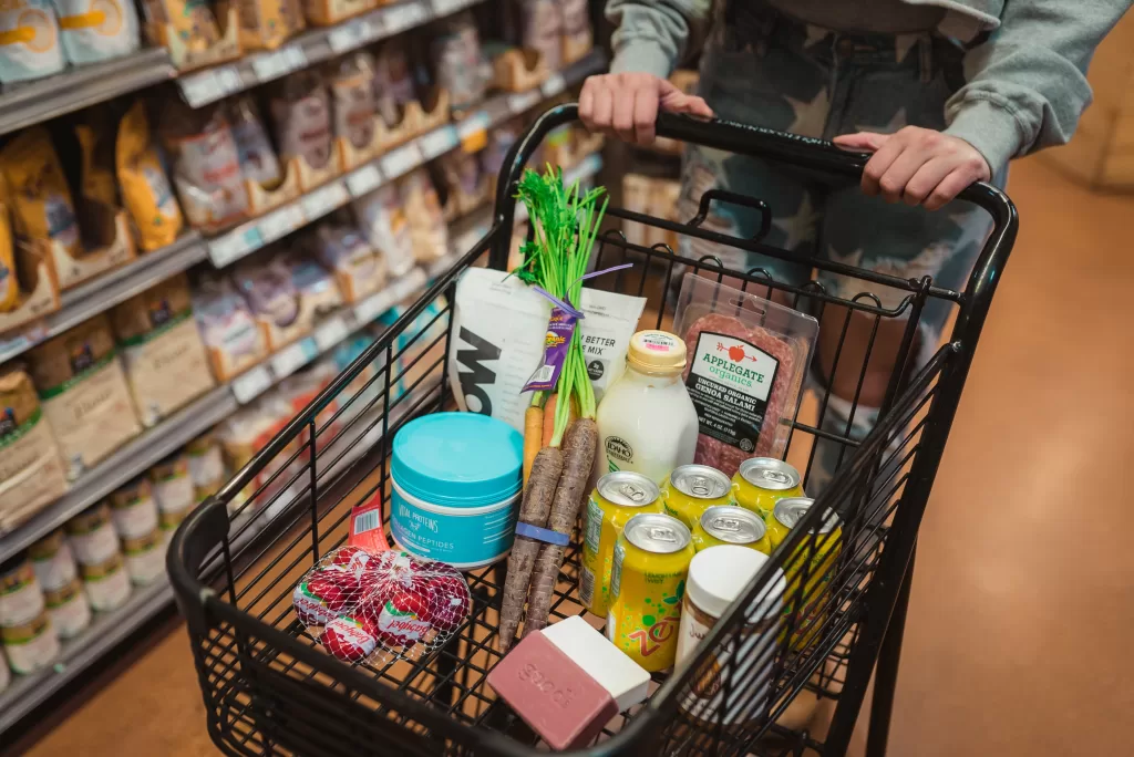 Variety of snacks in a shopping cart. Closest Walmart to Disney WOrld