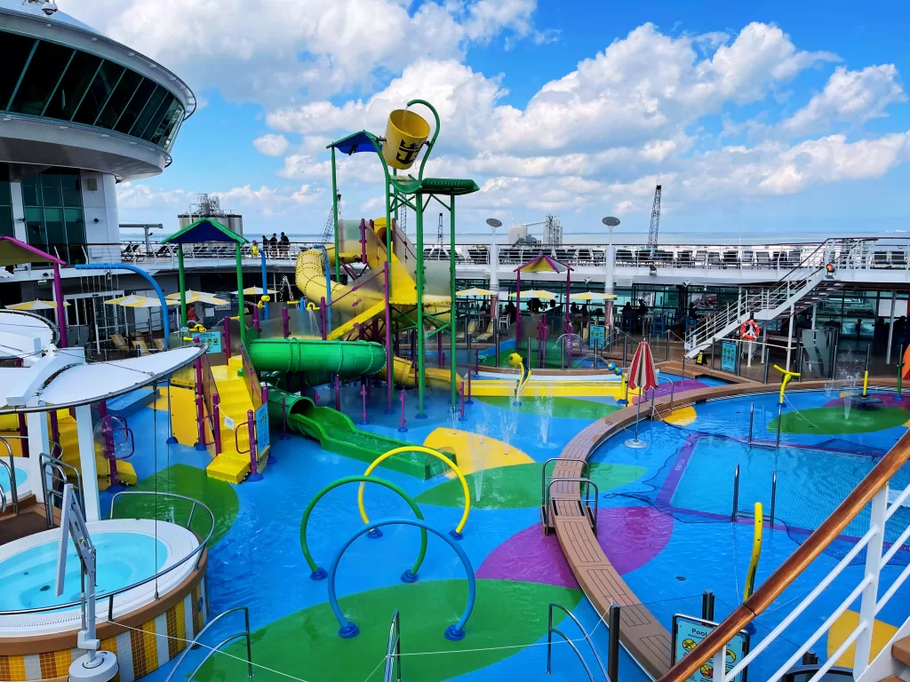 Large brightly colored splash pad on a cruise ship.  "independence of the seas with Kids"