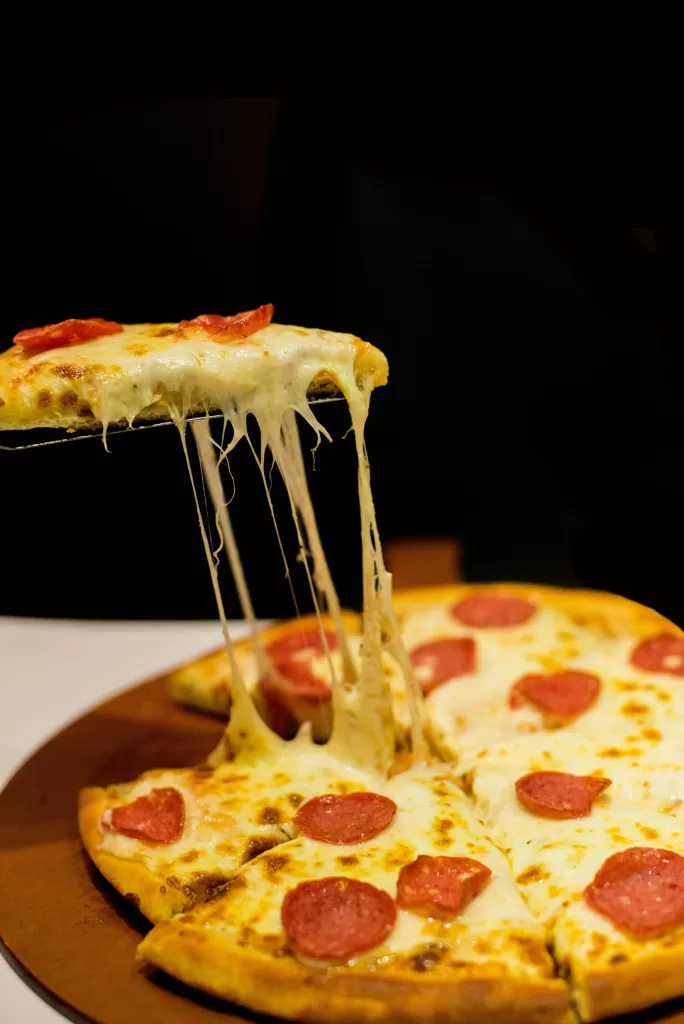 Cheesy pepperoni pizza as we examine what food is free on navigator of the seas.