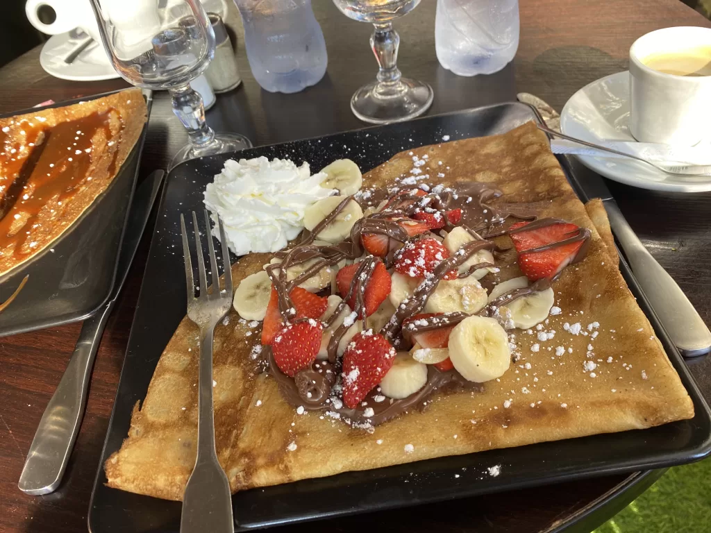 Crepe with bananas, strawberries and chocolate sauce as the best breakfast in epcot.