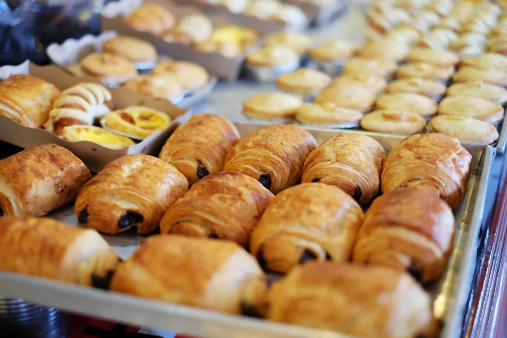 Variety of pastries in pastry case at epcot when talking about the best breakfast in epcot. 