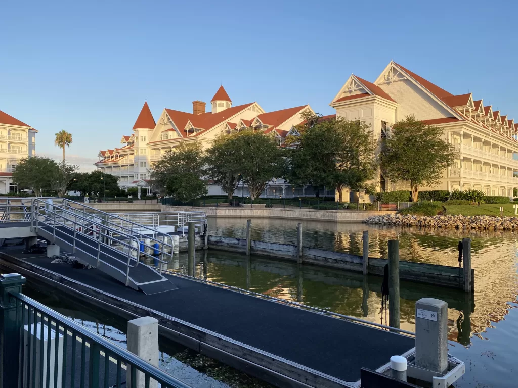 boat dock at grand floridian resort. White buildings in the background
