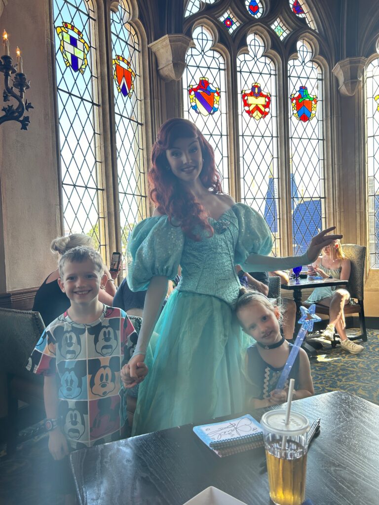 Disney's Ariel with two young children