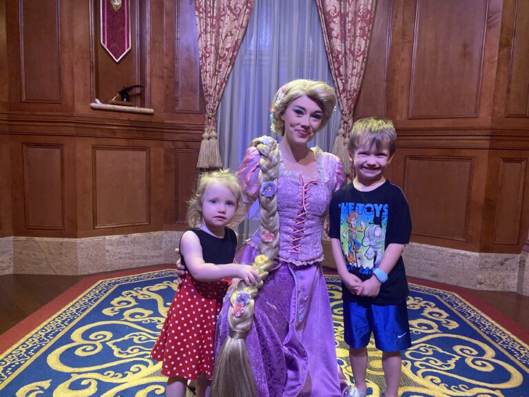 Disney's Rapunzel character with two small children